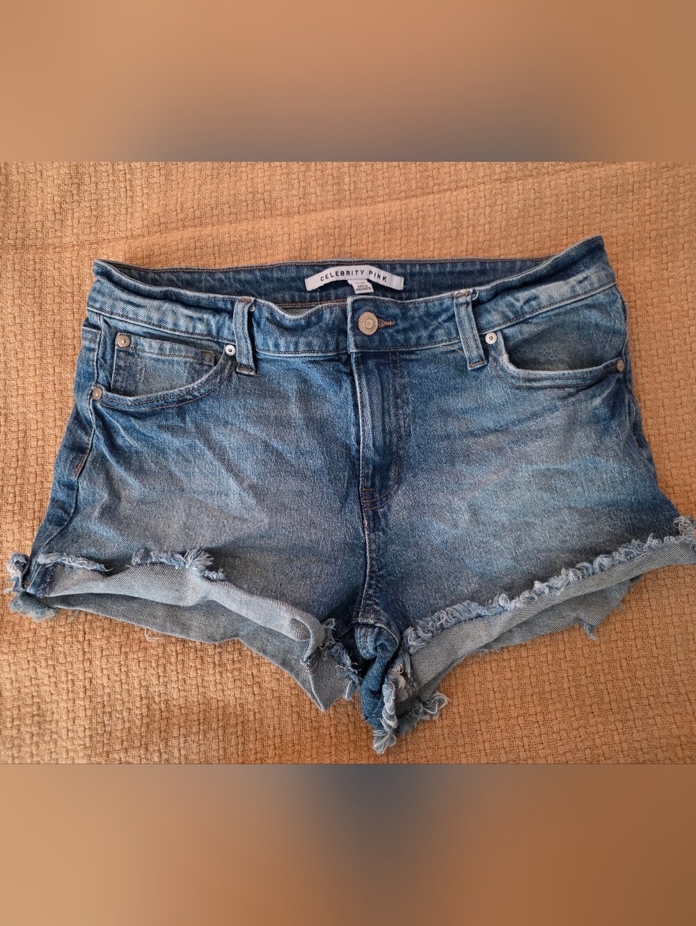 Celebrity Pink Mid Rise Medium Blue Jean Cut Off Shorts